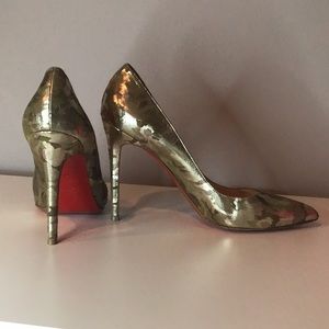 Christian Louboutin camo heels.